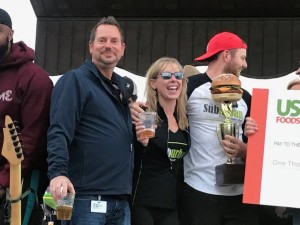 Suburban Owner Cindy Berset Celebrates Win at TC Burger Battle 2018